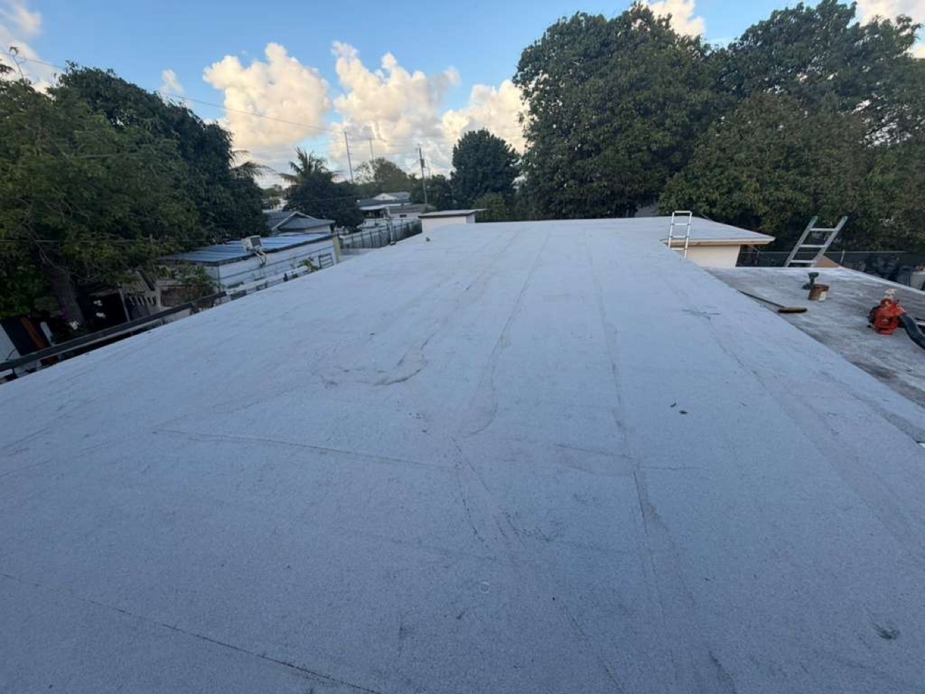 Finished flat roof with ladder, wide view