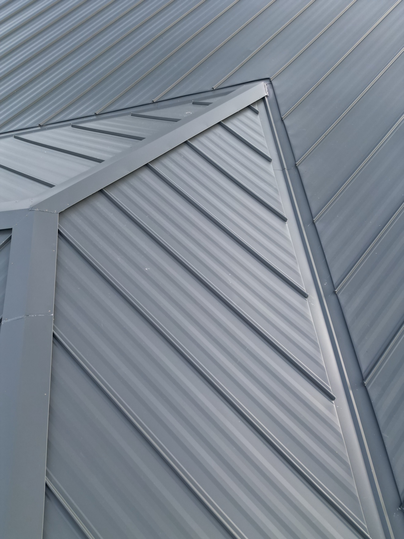 Close-up of finished metal roof panels