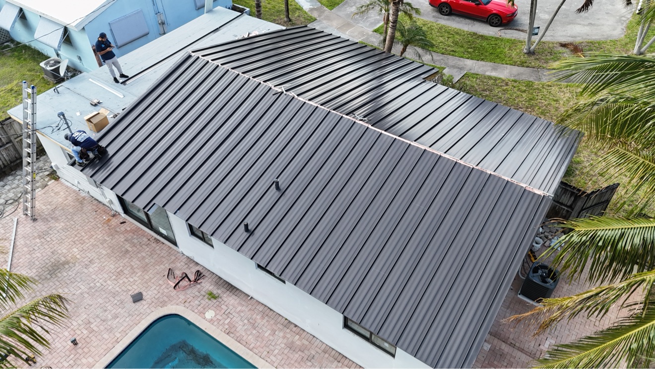 Aerial view of standing seam metal roof installation
