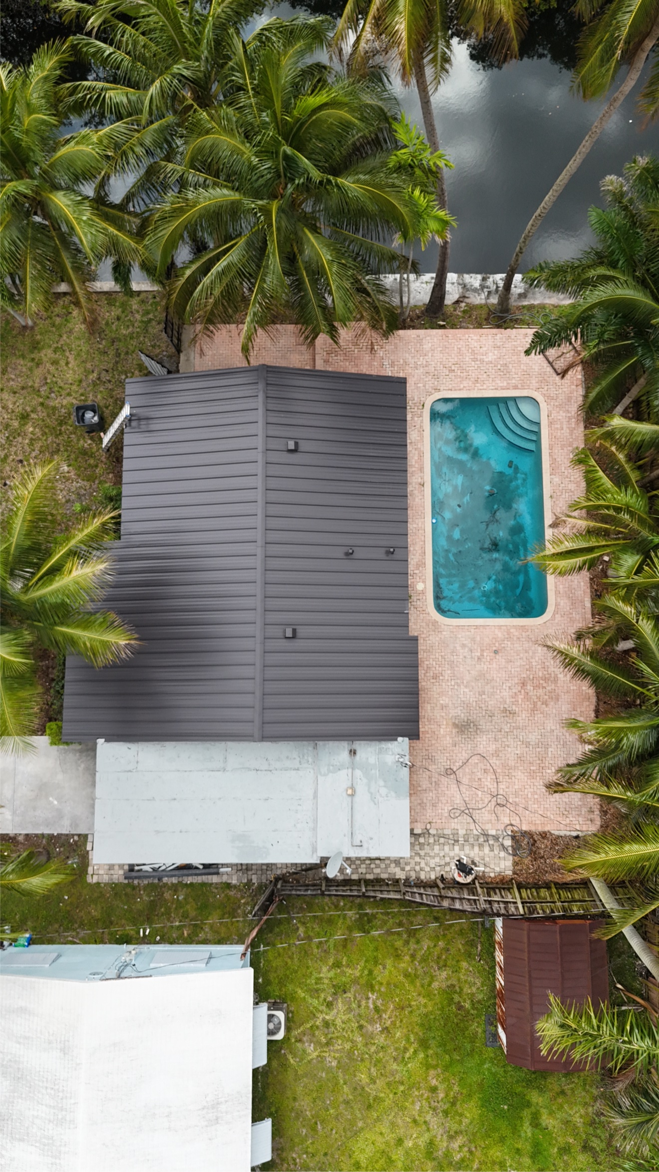 Top-down aerial of finished metal roof