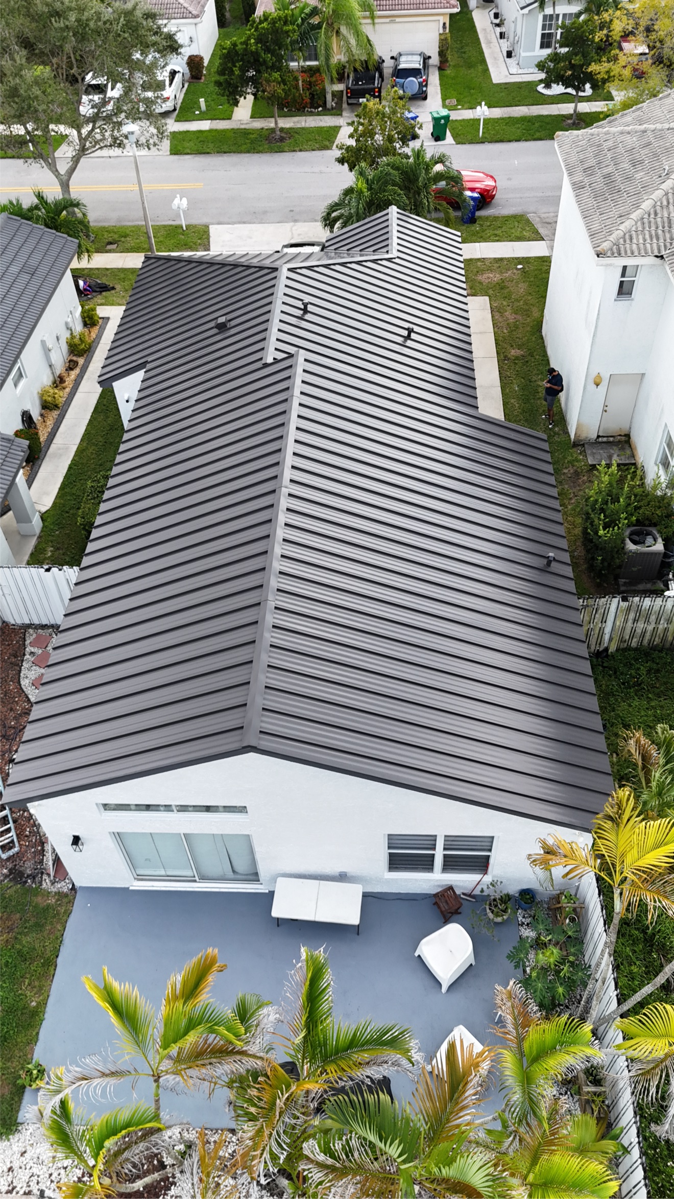Aerial of finished metal roof with patio