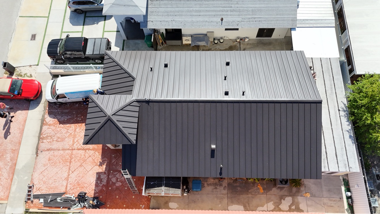 Top-down aerial of a finished metal roof
