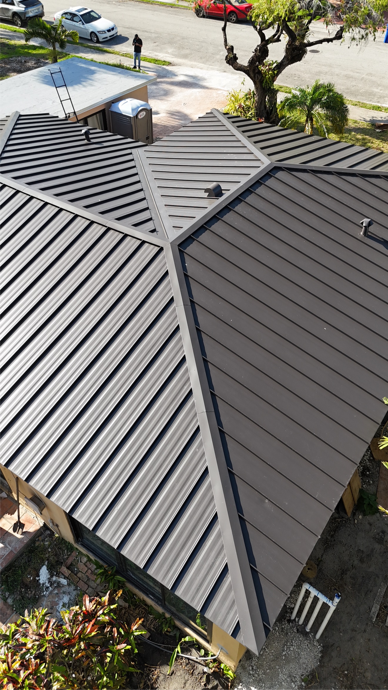 Aerial of finished metal roof from the street side