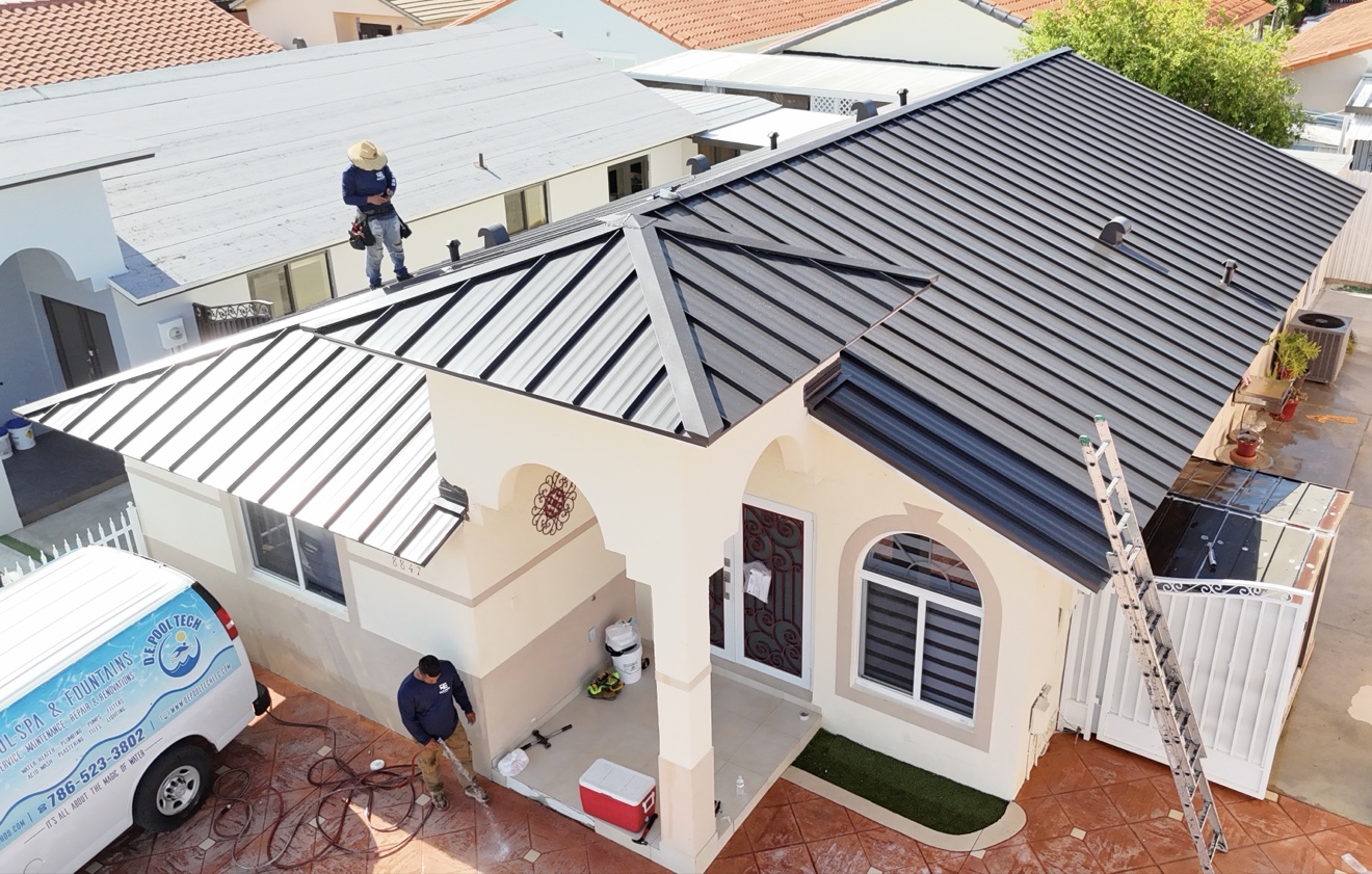 Front view of a home with a new metal roof