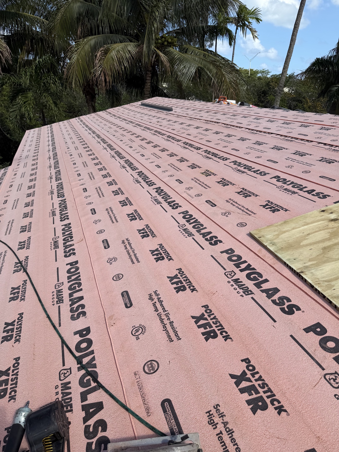 Polyglass Polystick XFR high-temp underlayment installed on a metal roof deck