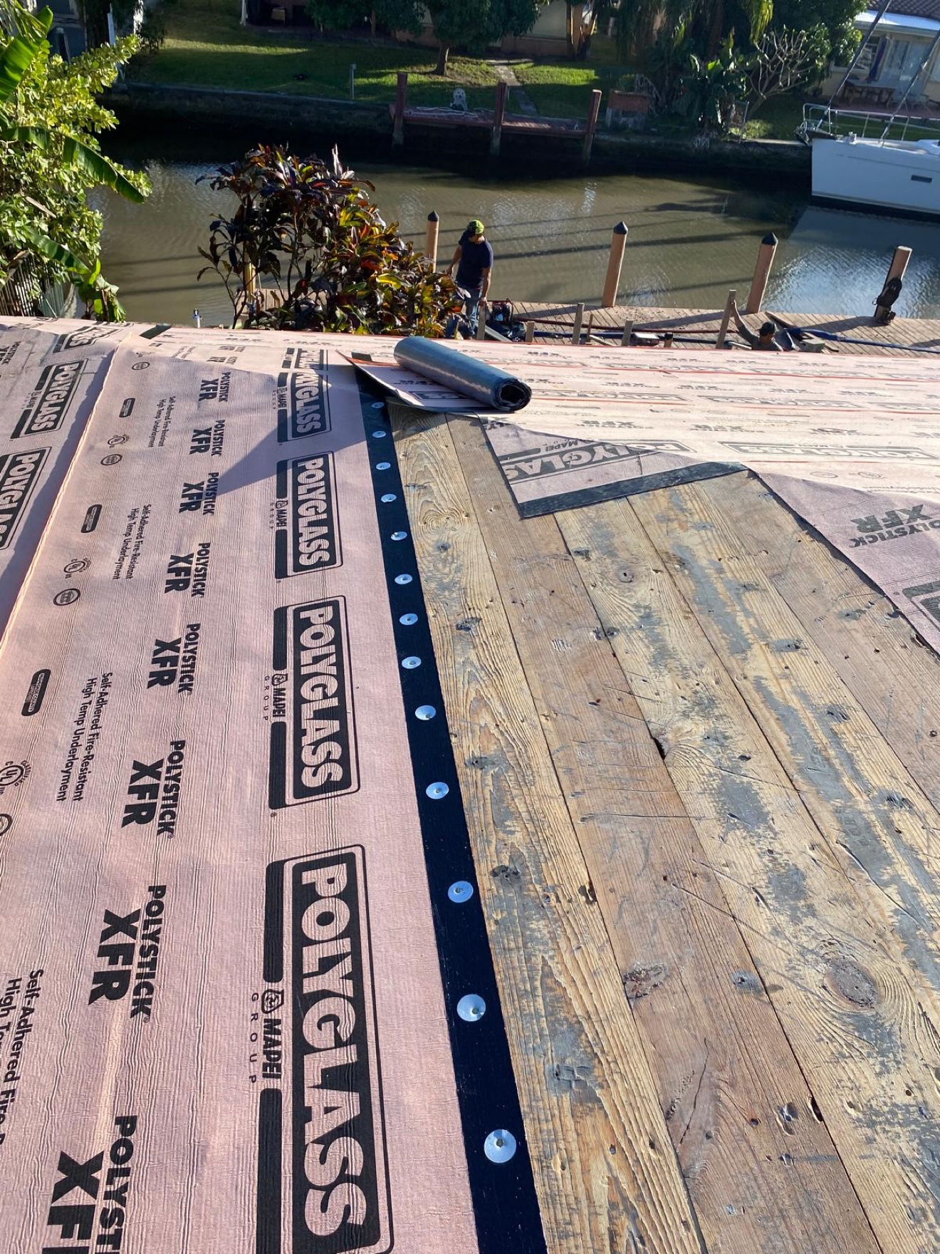 Close-up of underlayment install with canal view