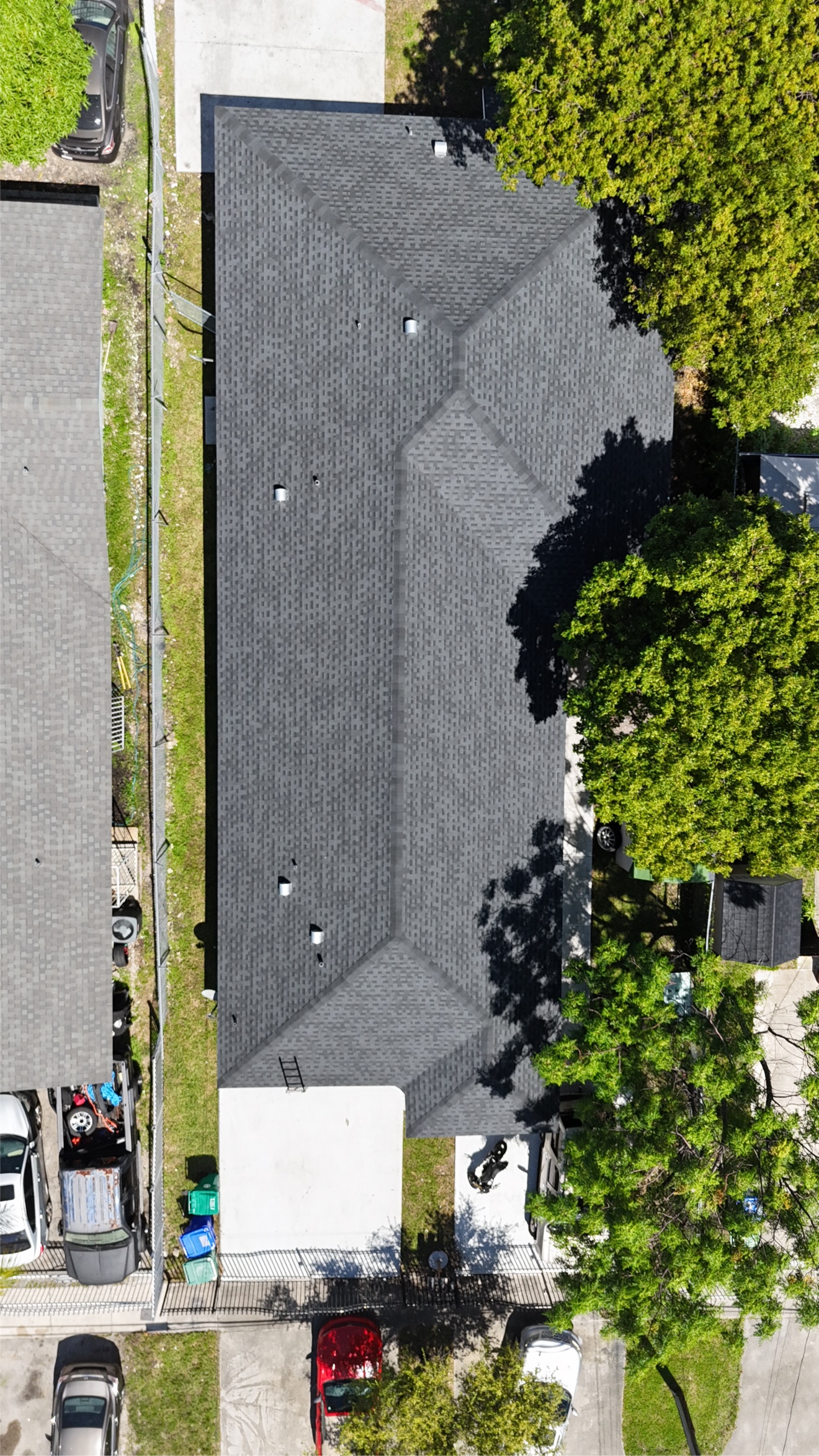 Top-down aerial of a finished shingle roof