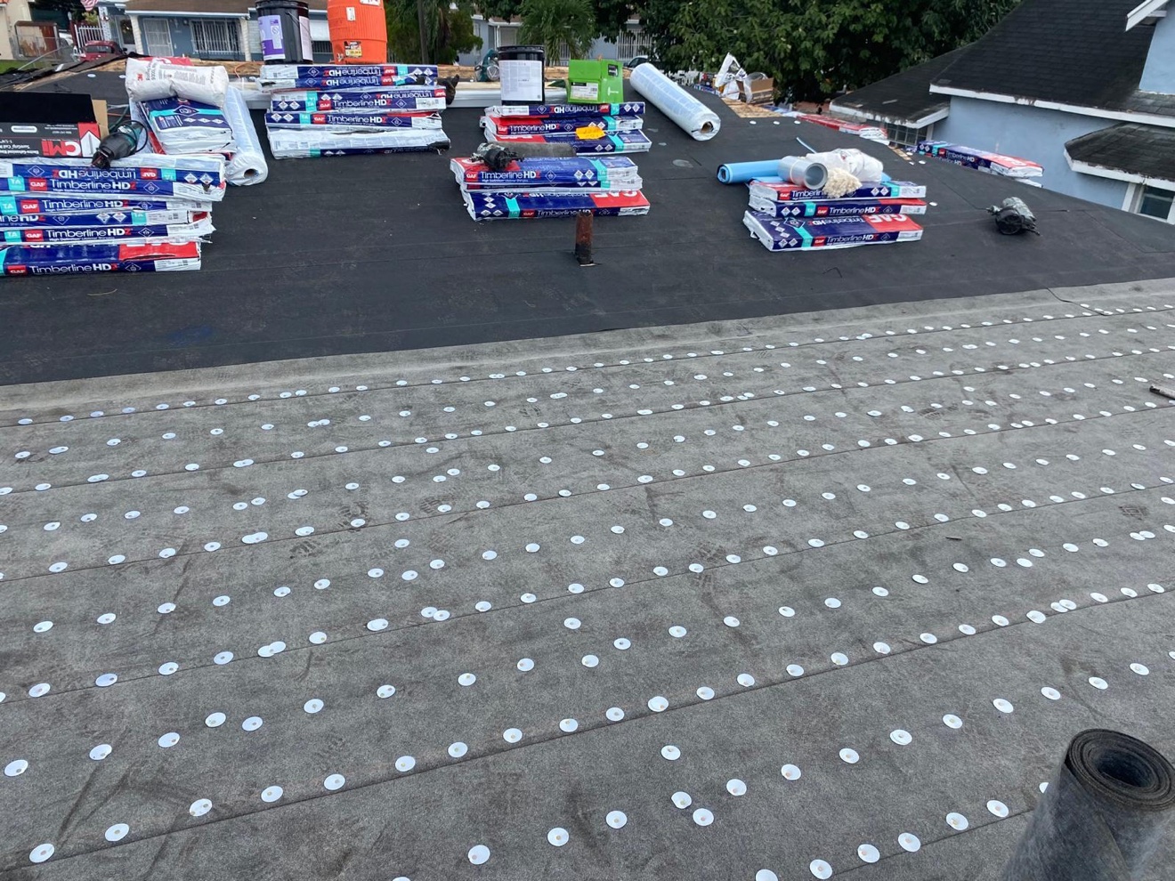 GAF Timberline HD bundles staged on a shingle roof