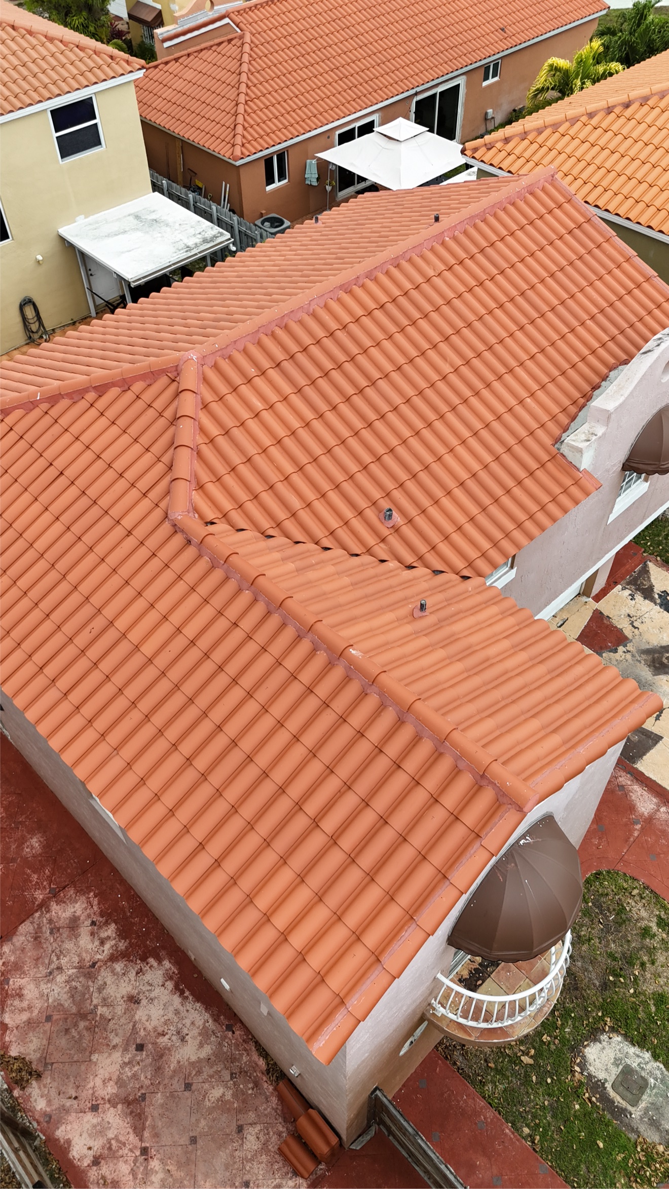 Aerial of a finished clay tile roof from the side