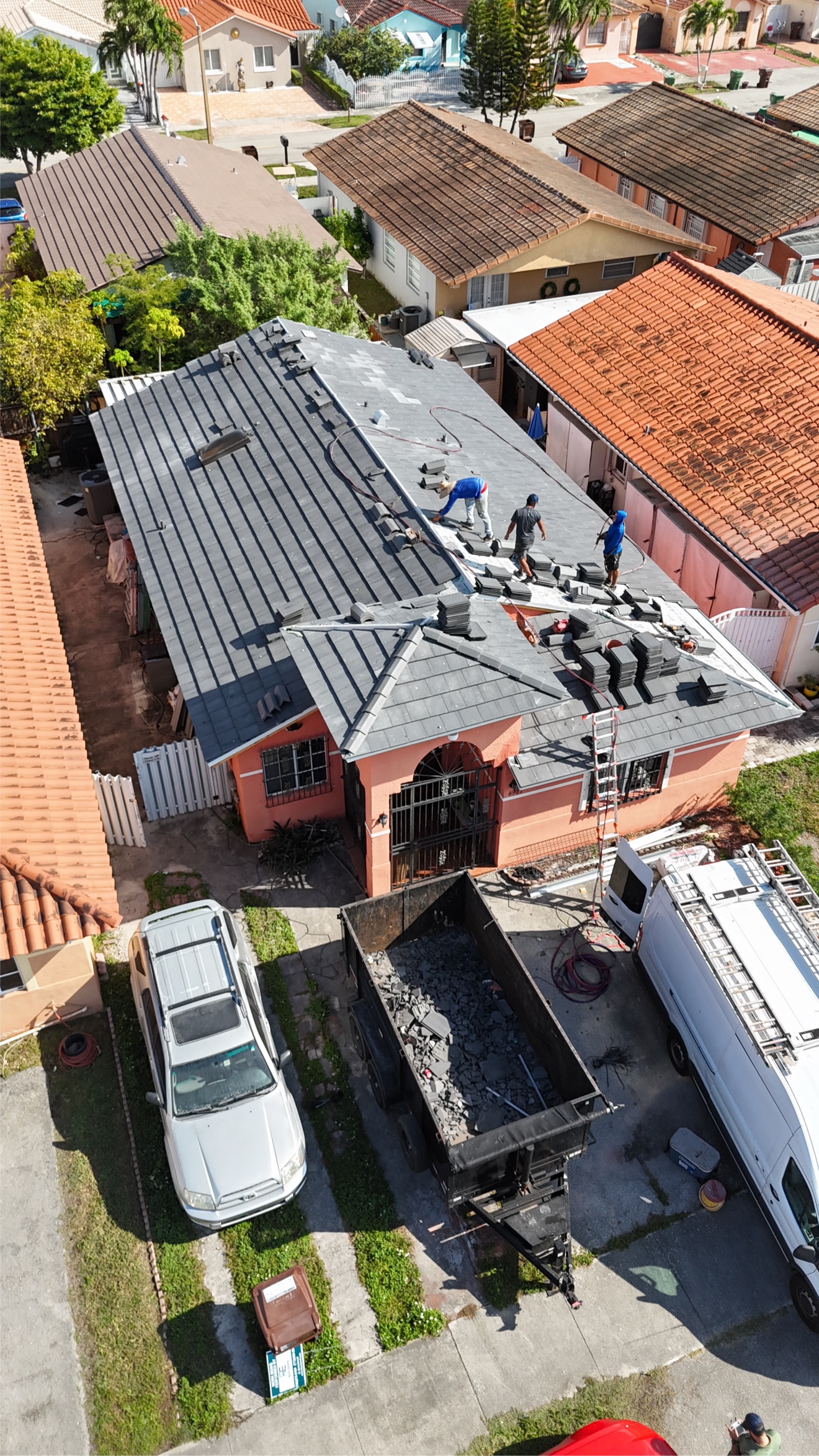 Aerial of tiles being installed on the roof