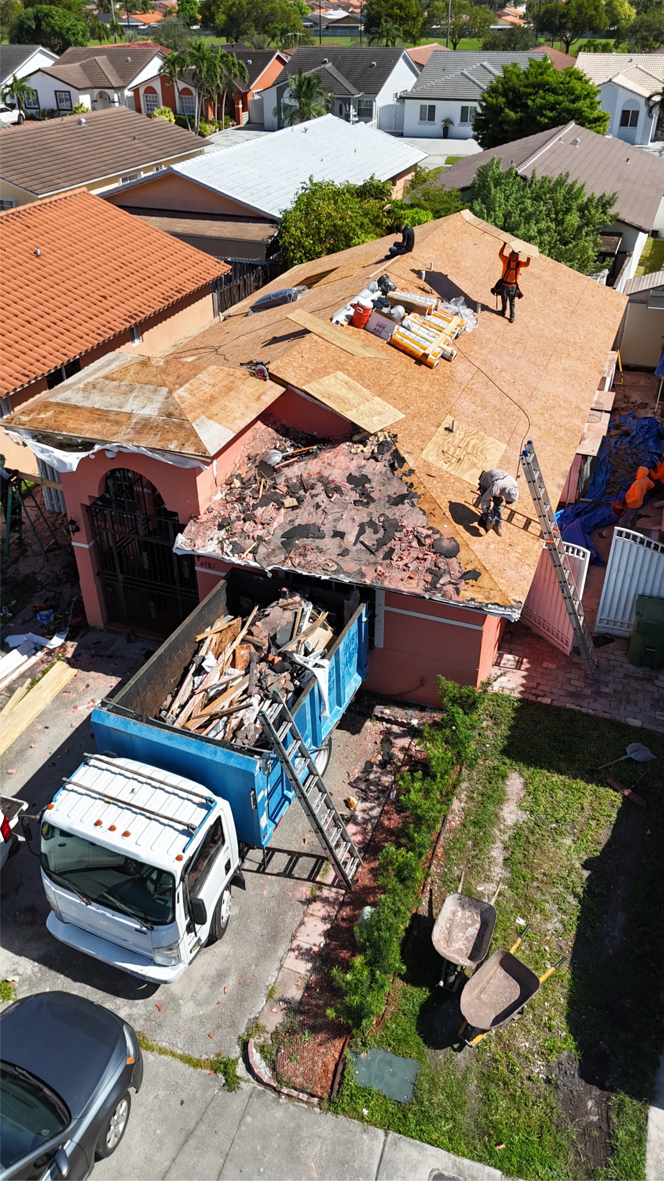 Aerial of tear-off on a house before tile installation