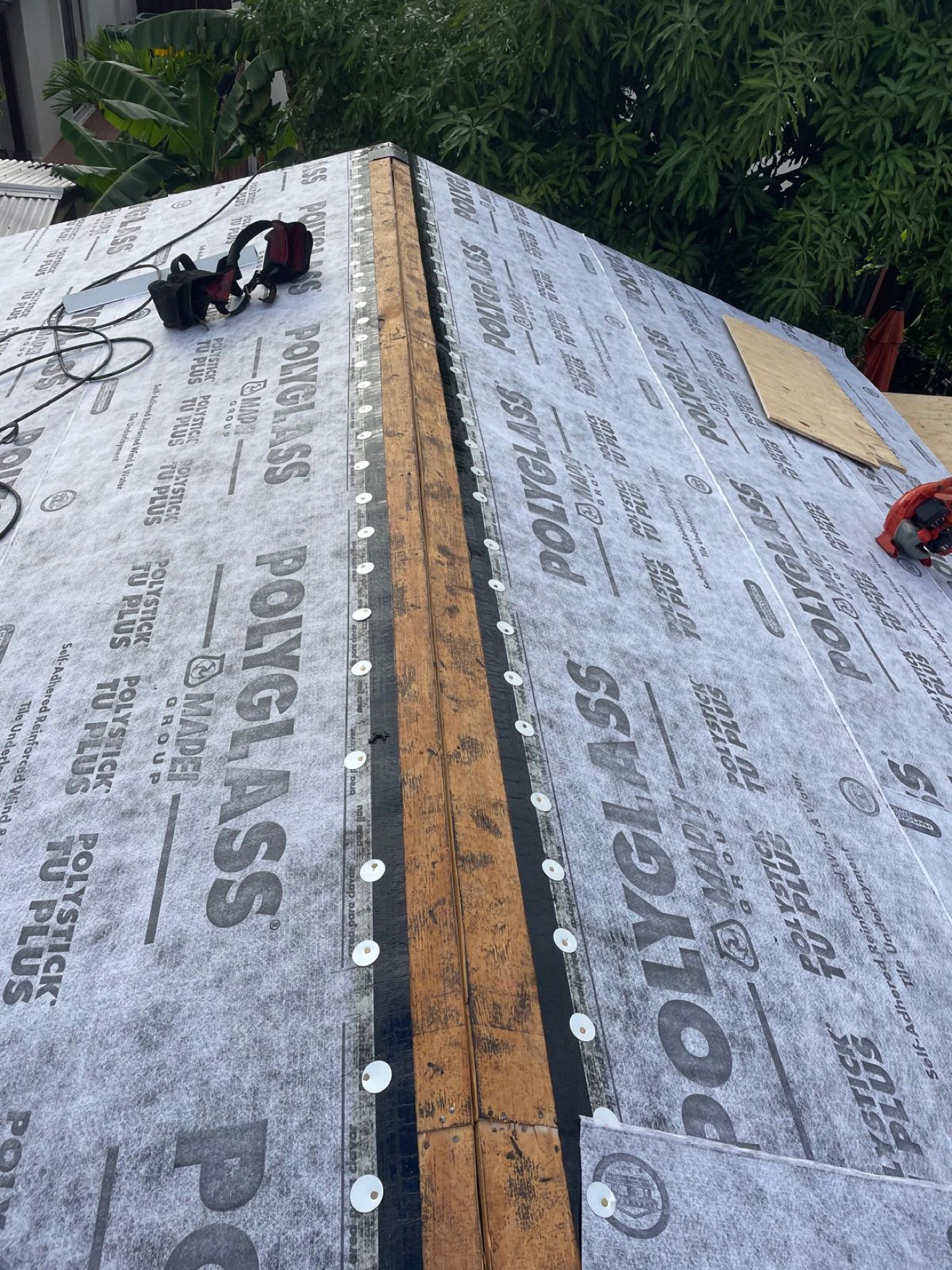 Close-up of ridge underlayment install for tile roof