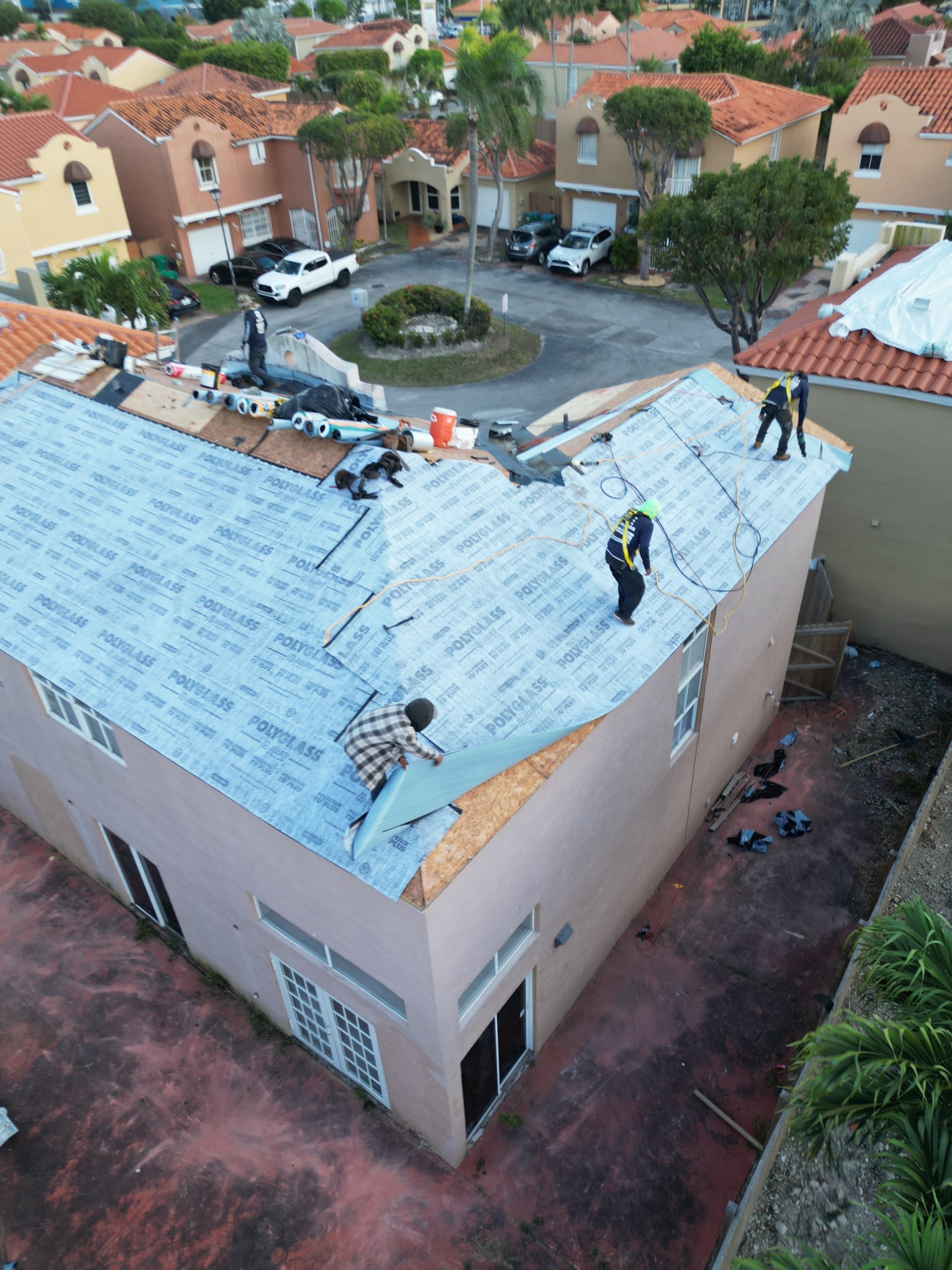 Aerial of underlayment being installed on the roof